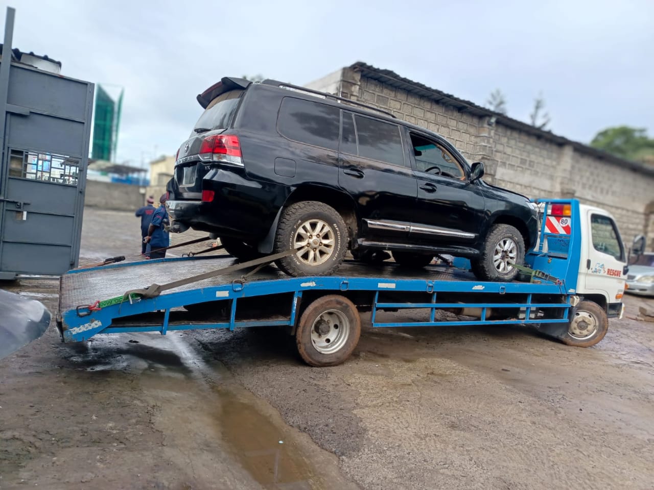 SUV secured on a flatbed for premium vehicle transport